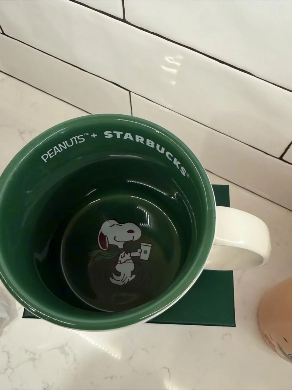 Starbucks Peanuts White Ceramic Mug with Green Interior